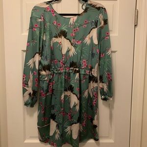 Zara green printed mini dress with open back.